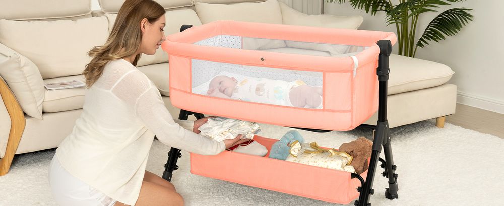 Restocking the basket of a Pink BCOL bassinet